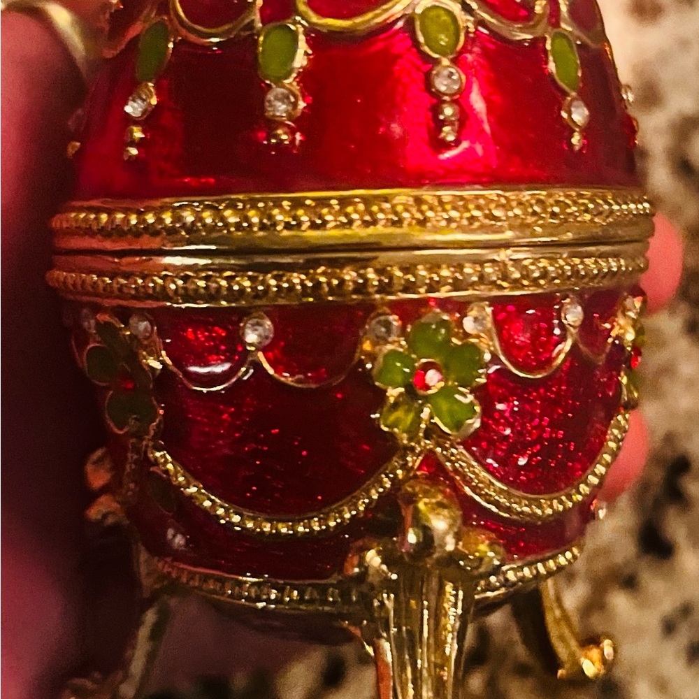 Red and Gold Decorative Egg with Green Accents